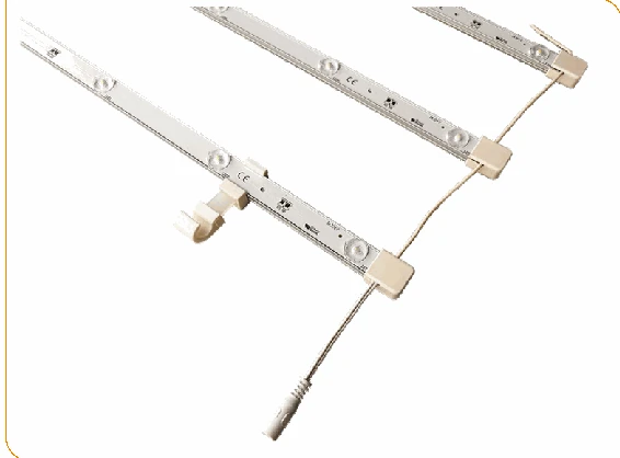 Connected ladder of LED bars for backlighting a SEG fabric lightbox