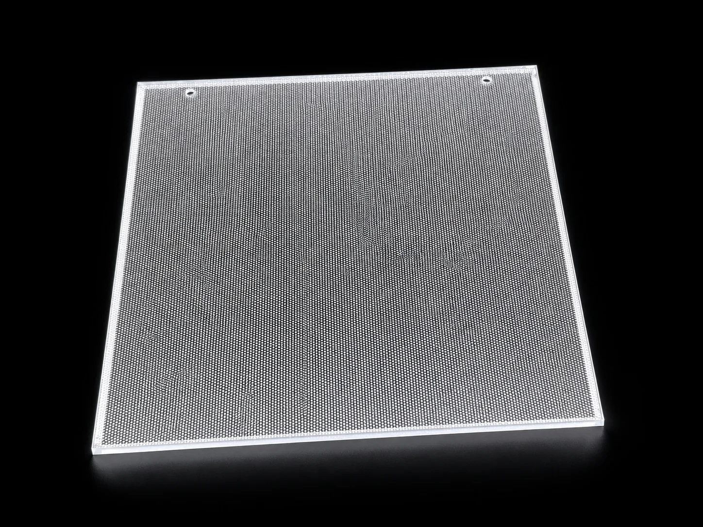 Laser-dot PMMA light guide plate illuminated from its edge
